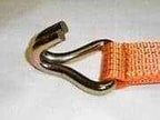 Close-up of a metal hook attached to an orange ratchet straps tie down for secure cargo fastening